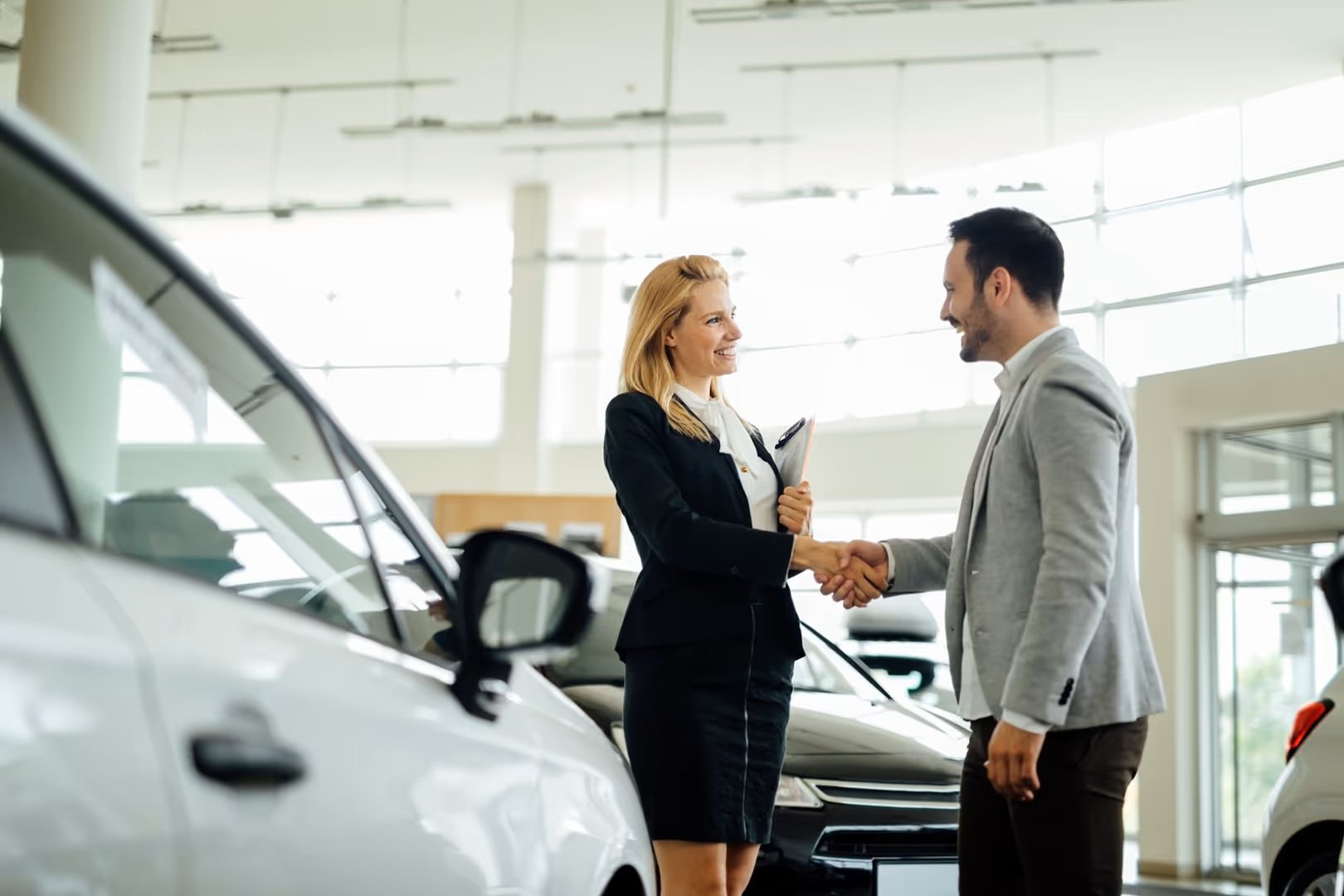 Ford team member shaking hands with customer searching for New Ford Vehicles for Sale near You