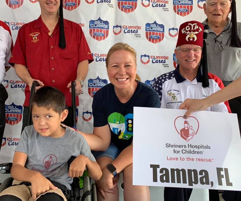Jennifer Currie and Bentley at Shriners Hospitals event