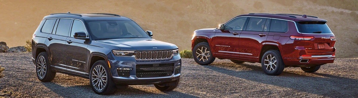 Jeep Grand Cherokee SUVs Parked on a Hill