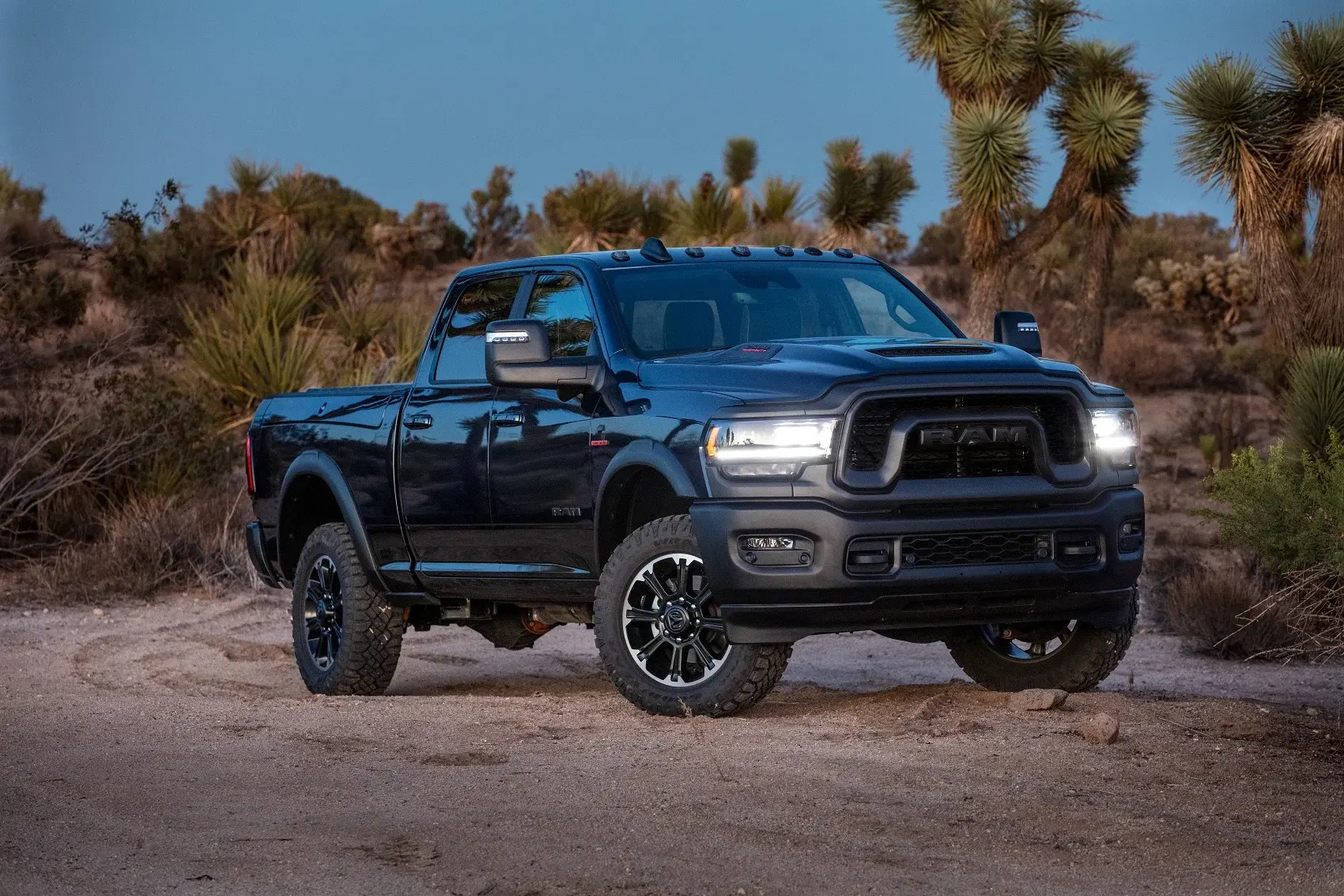 Black Ram truck parked in the desert
