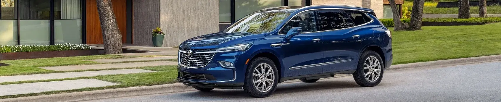 Blue Buick Enclave Parked on a Neighborhood Street