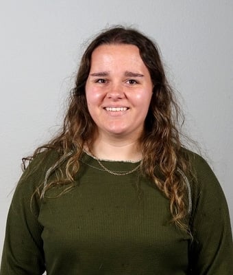 Title Clerk Taegan Schweitzer in Office at Eide Kia Mandan