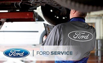 Ford Service Technician Changing Tire