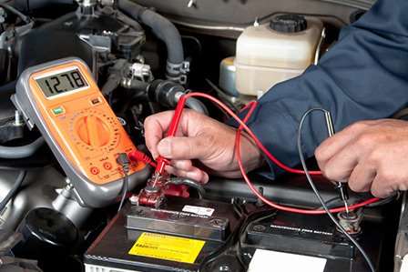 Checking a car's battery at Westbury Toyota on Long Island, NY.