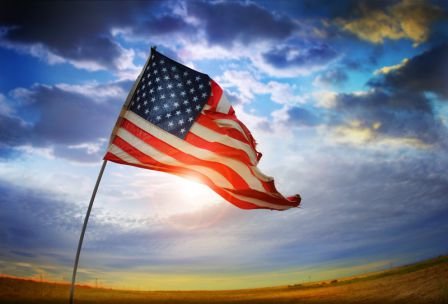 American flag waving in the wind on Labor Day in Westbury, NY.