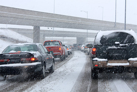 Harsh winter weather and traffic on the streets of Long Island, NY.