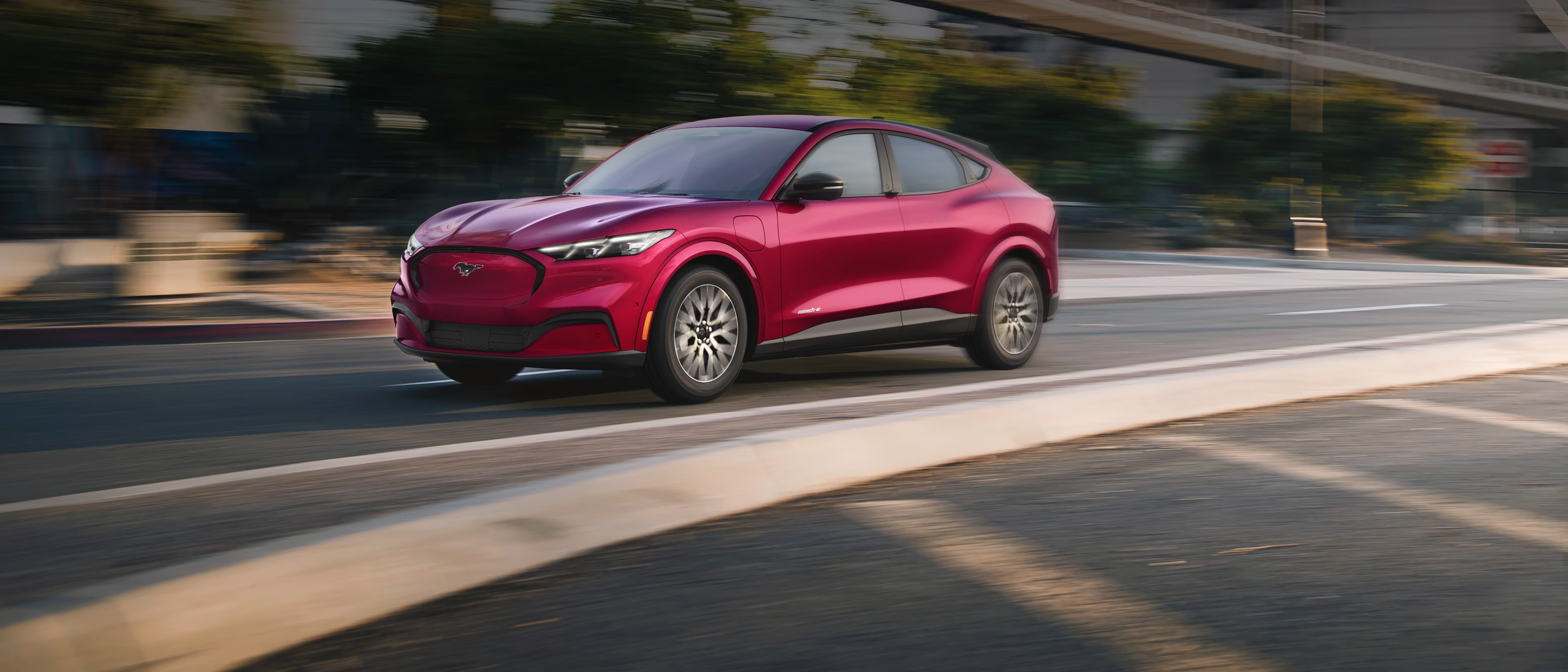 Red Mustang Mach-E Driving