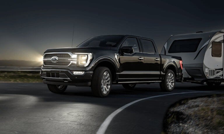 2021 Ford F150 Exterior Driving At Night While Pulling Camper