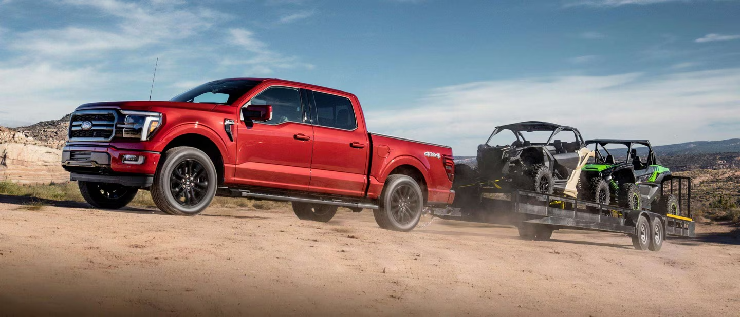 Red Ford F-150 towing