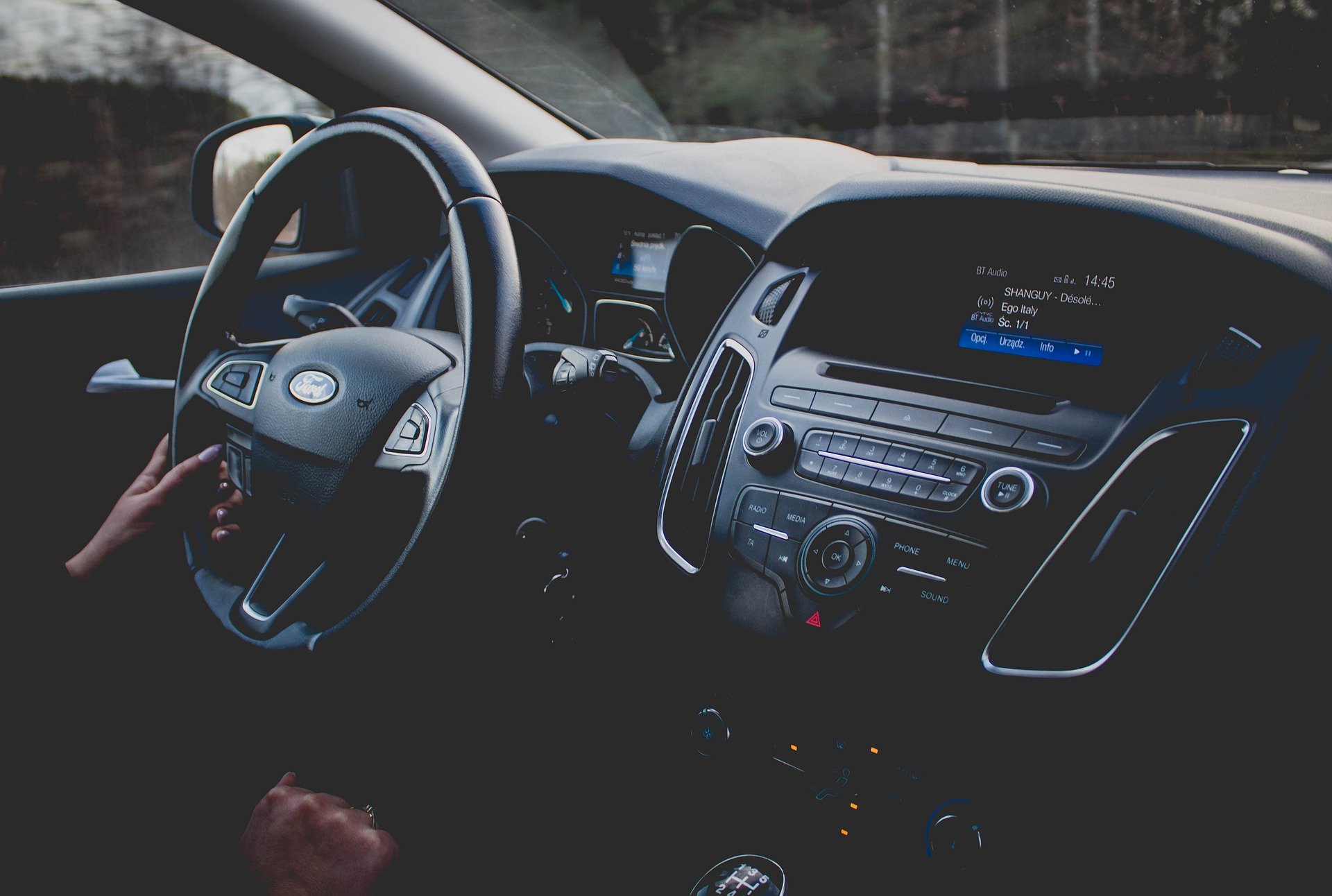 The black dashboard of a new Ford SUV.