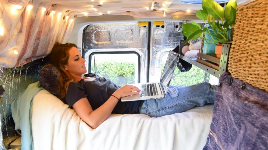 Surfer and graphic designer Tasha Rivard lives in a 2010 Transit Connect in Carbondale, Colorado.