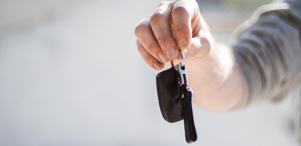 Sell My Car Fast Holding Car Keys